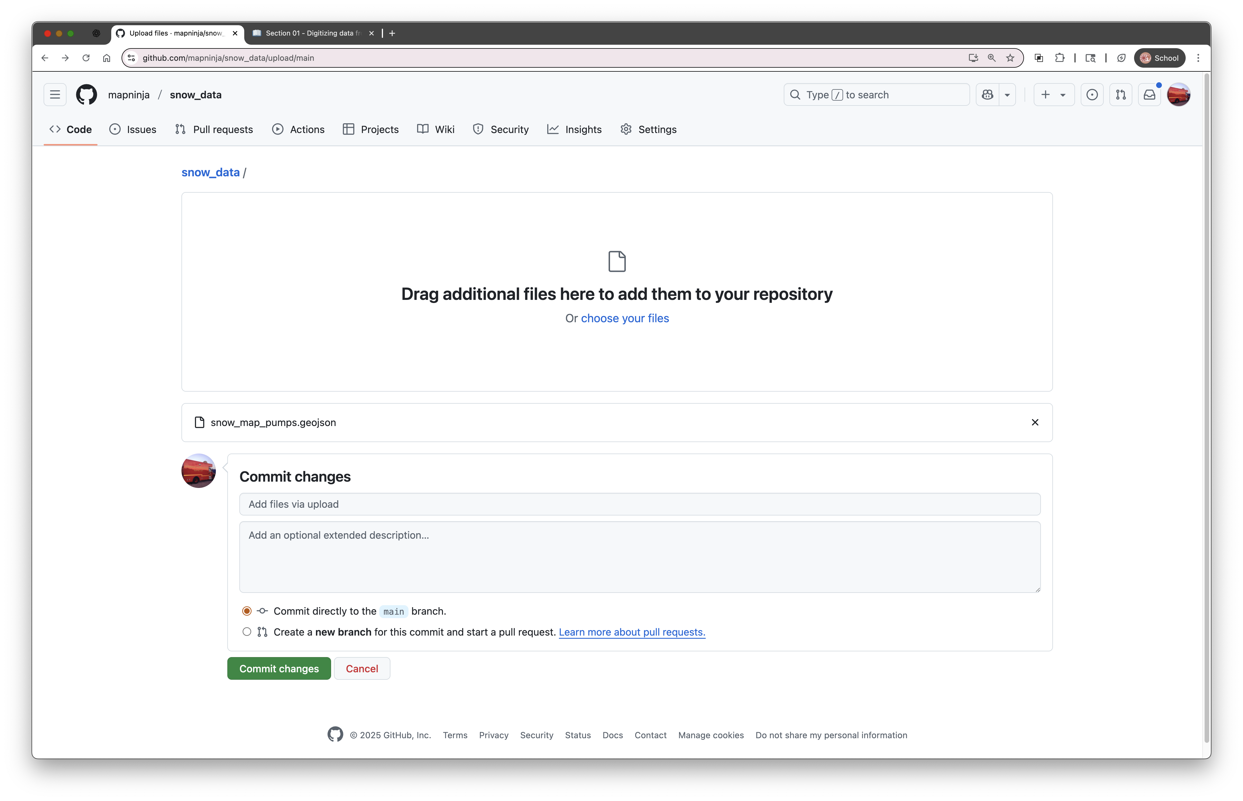 Alt text: Screenshot of GitHub’s file upload page with a GeoJSON file dragged into the drop area and the “Commit changes” button below.
